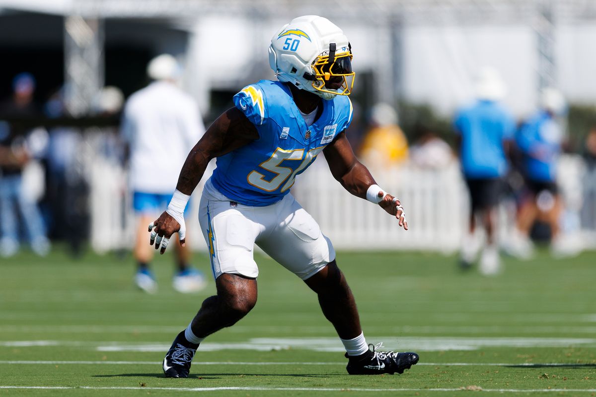 Emany Johnson #50 of the Los Angeles Chargers defends in coverage during training camp at The Bolt on August 6, 2026 in El Segundo, California. Emany Johnson #50 of the Los Angeles Chargers defends in coverage during training camp at The Bolt on August 6, 2026 in El Segundo, California.