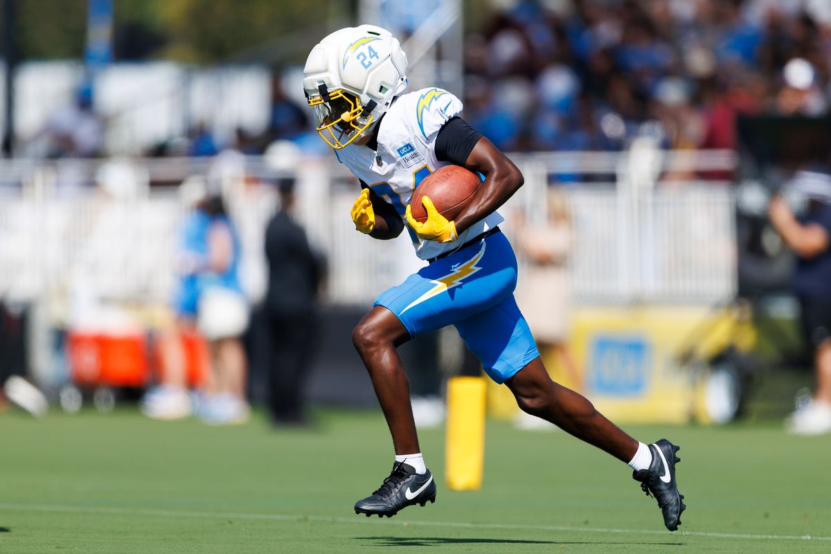 Devonte Ross #24 of the Los Angeles Chargers runs with the ball during training camp at The Bolt on August 8, 2026 in El Segundo, California. Devonte Ross #24 of the Los Angeles Chargers runs with the ball during training camp at The Bolt on August 8, 2026 in El Segundo, California.