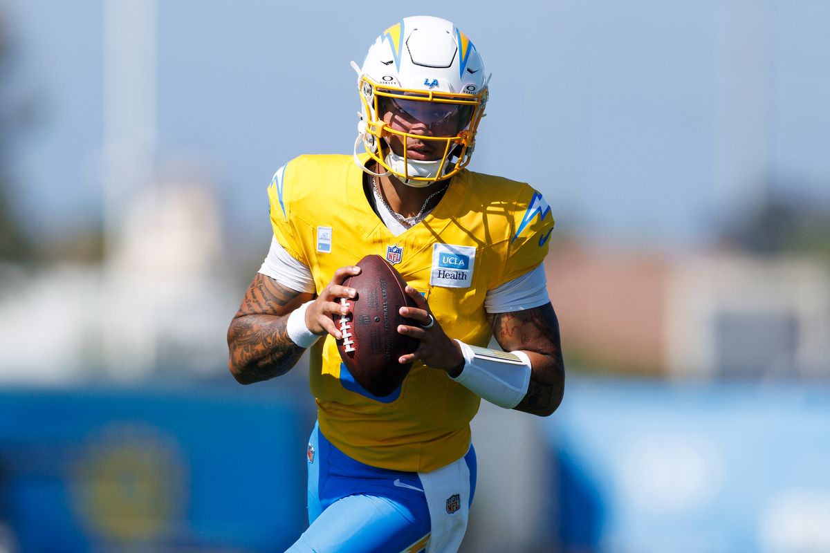Trey Lance #5 of the Los Angeles Chargers rolls out to pass during training camp at The Bolt on August 8, 2026 in El Segundo, California. Trey Lance #5 of the Los Angeles Chargers rolls out to pass during training camp at The Bolt on August 8, 2026 in El Segundo, California.