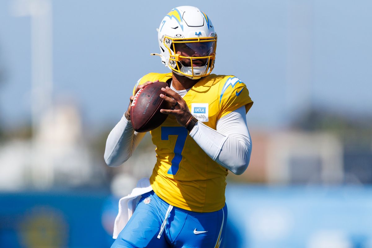 DJ Uiagalelei #7 of the Los Angeles Chargers rolls out to pass during training camp at The Bolt on August 8, 2026 in El Segundo, California. DJ Uiagalelei #7 of the Los Angeles Chargers rolls out to pass during training camp at The Bolt on August 8, 2026 in El Segundo, California.