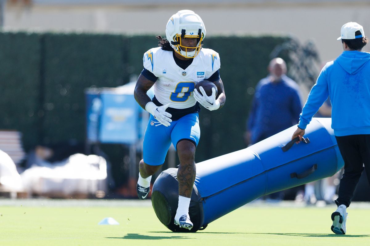 Omarion Hampton #8 of the Los Angeles Chargers runs with the ball during training camp at The Bolt on August 8, 2026 in El Segundo, California. Omarion Hampton #8 of the Los Angeles Chargers runs with the ball during training camp at The Bolt on August 8, 2026 in El Segundo, California.