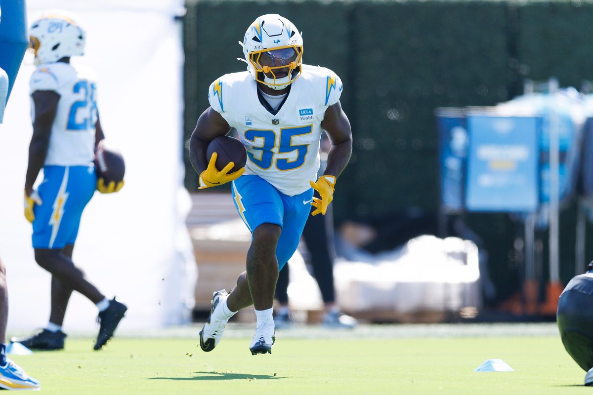 Amar Johnson #35 of the Los Angeles Chargers runs with the ball during training camp at The Bolt on August 8, 2026 in El Segundo, California. Amar Johnson #35 of the Los Angeles Chargers runs with the ball during training camp at The Bolt on August 8, 2026 in El Segundo, California.