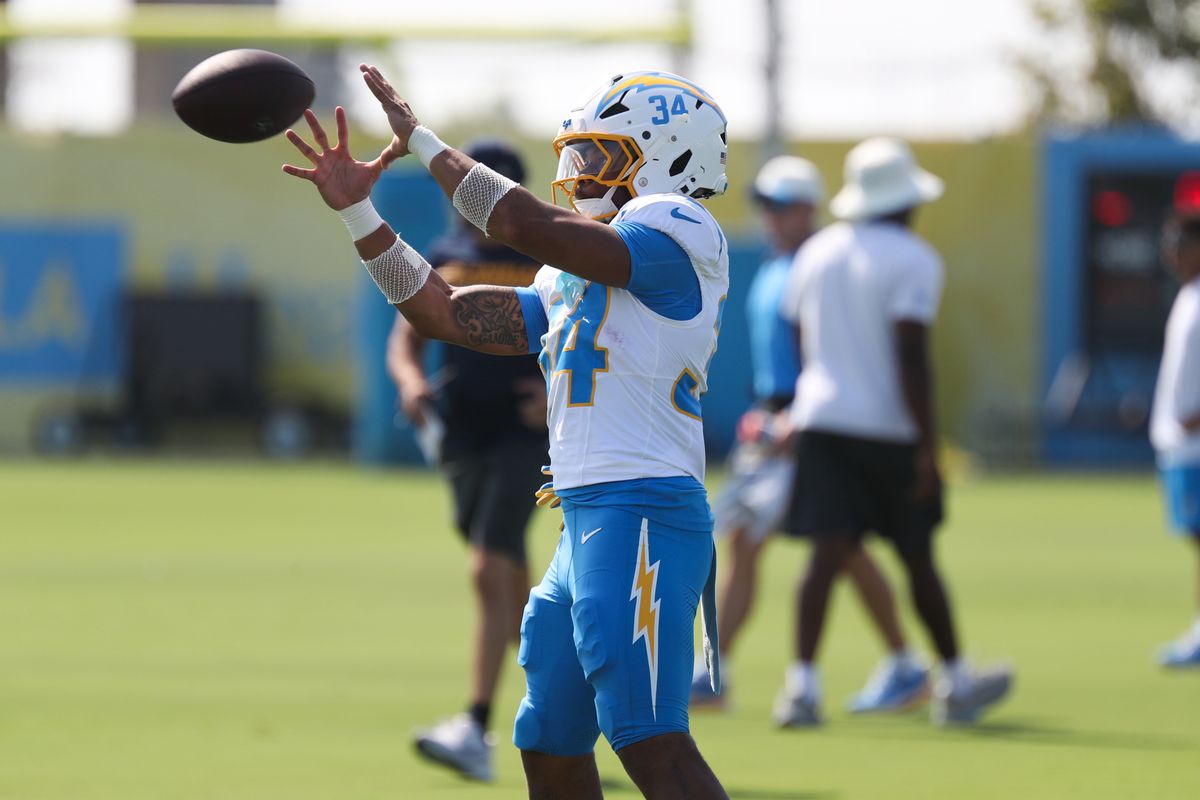 Keaton Mitchell #34 of the Los Angeles Chargers participates in drills during training camp at The Bolt on August 9, 2026 in El Segundo, California. Keaton Mitchell #34 of the Los Angeles Chargers participates in drills during training camp at The Bolt on August 9, 2026 in El Segundo, California.