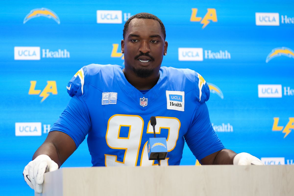 Justin Eboigbe #92 of the Los Angeles Chargers speaks to the media during training camp at The Bolt on August 9, 2026 in El Segundo, California. Justin Eboigbe #92 of the Los Angeles Chargers speaks to the media during training camp at The Bolt on August 9, 2026 in El Segundo, California.