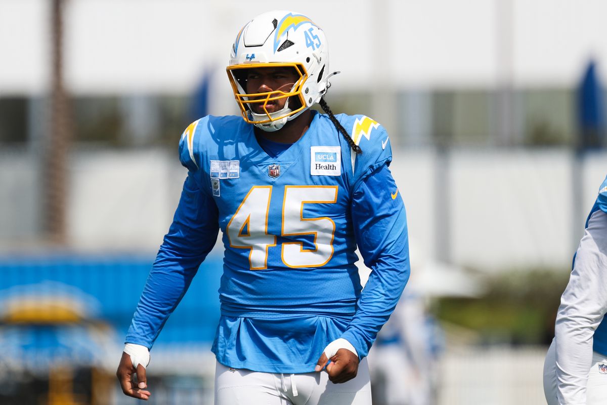 Tuli Tuipulotu #45 of the Los Angeles Chargers looks on during training camp at The Bolt on August 11, 2026 in El Segundo, California. Tuli Tuipulotu #45 of the Los Angeles Chargers looks on during training camp at The Bolt on August 11, 2026 in El Segundo, California.