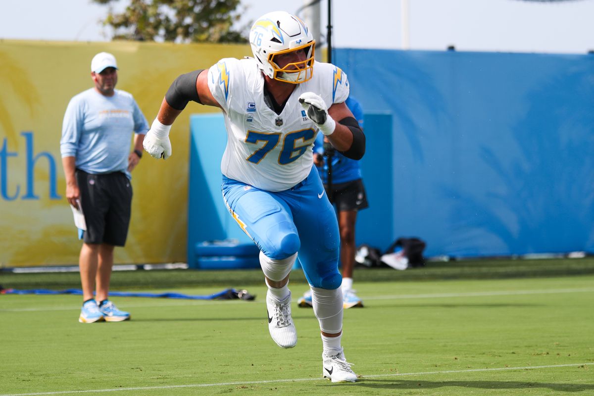 Joe Alt #76 of the Los Angeles Chargers participates in drills during training camp at The Bolt on August 11, 2026 in El Segundo, California. Joe Alt #76 of the Los Angeles Chargers participates in drills during training camp at The Bolt on August 11, 2026 in El Segundo, California.