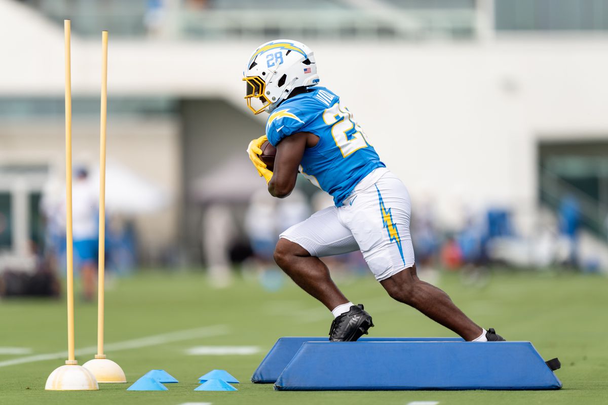 Los Angeles Chargers running back Kimani Vidal (28) doing running back drills during Chargers training camp at The Bolt on Saturday, August 15th in El Segundo, CA. Los Angeles Chargers running back Kimani Vidal (28) doing running back drills during Chargers training camp at The Bolt on Saturday, August 15th in El Segundo, CA.