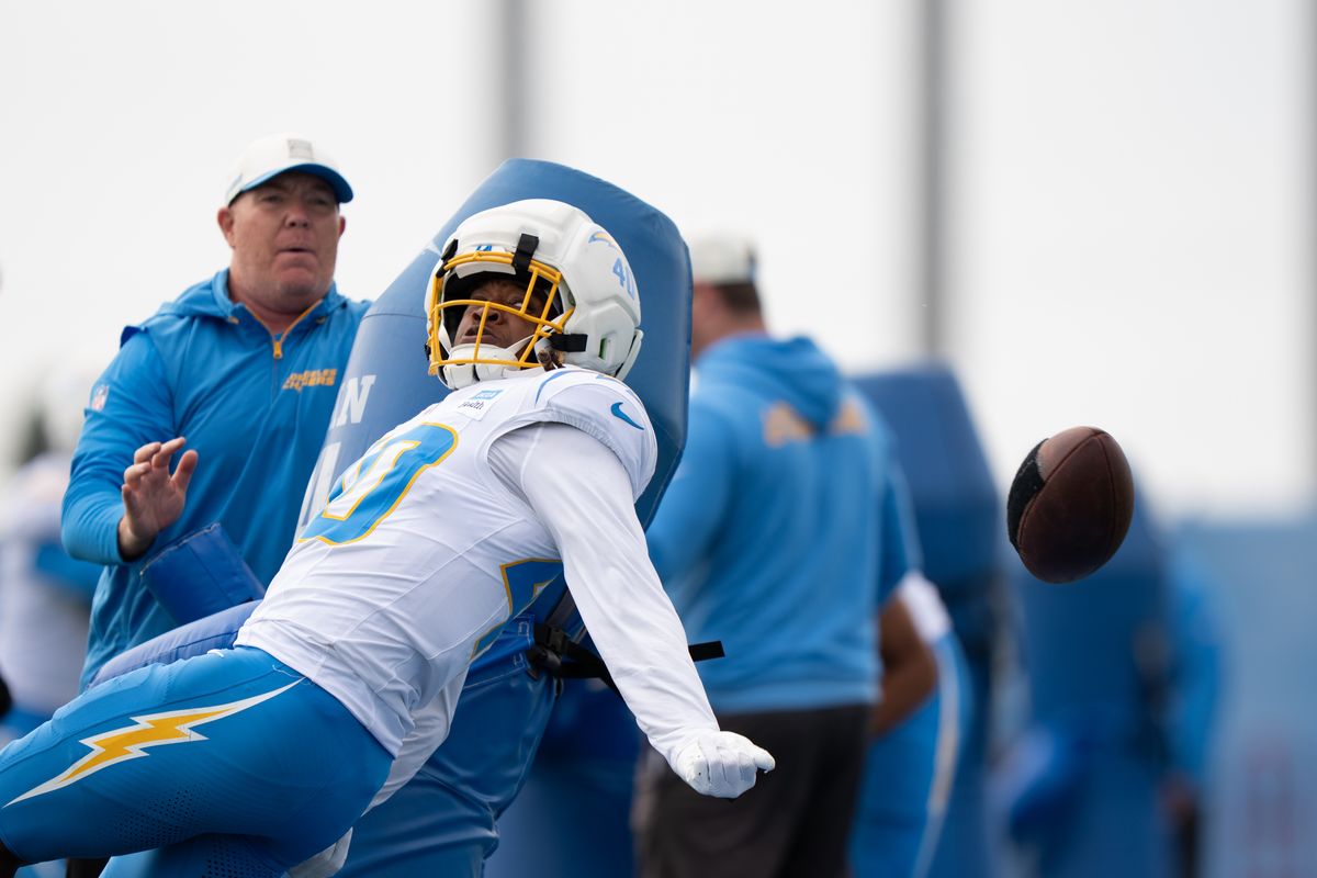 Los Angeles Chargers safety Kendall Williamson (40) stripping the ball from a dummy during Chargers training camp at The Bolt on Saturday, August 15th in El Segundo, CA. Los Angeles Chargers safety Kendall Williamson (40) stripping the ball from a dummy during Chargers training camp at The Bolt on Saturday, August 15th in El Segundo, CA.