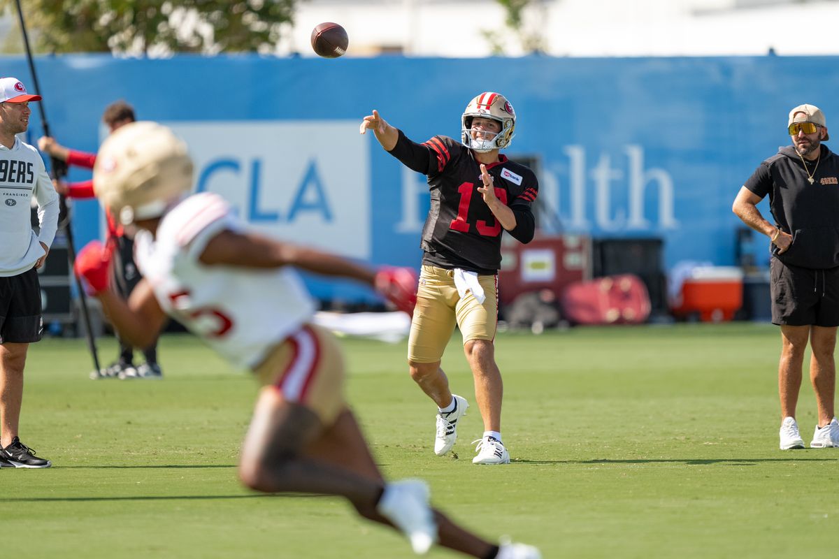 San Francisco 49ers quarterback Brock Purdy (13) passing the football to wide receiver Mike Evans (5) during a joint Chargers and 49ers training camp at The Bolt on Saturday, August 18th in El Segundo, CA. San Francisco 49ers quarterback Brock Purdy (13) passing the football to wide receiver Mike Evans (5) during a joint Chargers and 49ers training camp at The Bolt on Saturday, August 18th in El Segundo, CA.