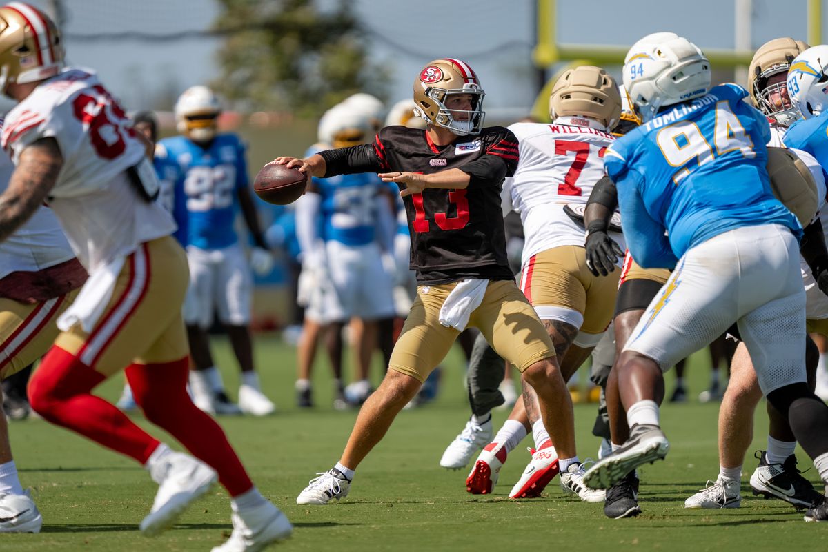San Francisco 49ers quarterback Brock Purdy (13) passing the football during a joint Chargers and 49ers training camp at The Bolt on Saturday, August 18th in El Segundo, CA. San Francisco 49ers quarterback Brock Purdy (13) passing the football during a joint Chargers and 49ers training camp at The Bolt on Saturday, August 18th in El Segundo, CA.