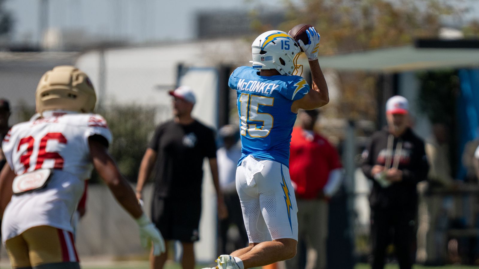 Los Angeles Chargers wide receiver Ladd McConkey (15) making a leaping catch during a joint Chargers and 49ers training camp at The Bolt on Saturday, August 18th in El Segundo, CA. Los Angeles Chargers wide receiver Ladd McConkey (15) making a leaping catch during a joint Chargers and 49ers training camp at The Bolt on Saturday, August 18th in El Segundo, CA.