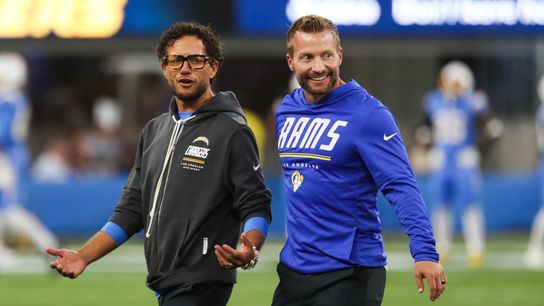 Los Angeles Rams head coach Sean McVay speaks with Los Angeles Chargers offensive coordinator Mike McDaniel prior to an NFL preseason game, August 27, 2026 at SoFi Stadium in Inglewood, California.