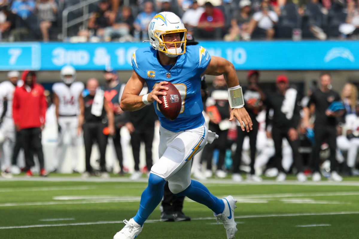Los Angeles Chargers QB Justin Herbert (10) rolls out of the pocket during an NFL game between the Los Angeles Chargers and Arizona Cardinals on Sunday, September 13, 2026 at SoFi Stadium in Inglewood, California. Los Angeles Chargers QB Justin Herbert (10) rolls out of the pocket during an NFL game between the Los Angeles Chargers and Arizona Cardinals on Sunday, September 13, 2026 at SoFi Stadium in Inglewood, California.