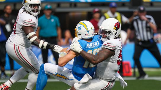 Los Angeles Chargers QB Justin Herbert (10) is sacked for a loss by Arizona Cardinals defenders during an NFL game between the Los Angeles Chargers and Arizona Cardinals on Sunday, September 13, 2026 at SoFi Stadium in Inglewood, California. Los Angeles Chargers QB Justin Herbert (10) is sacked for a loss by Arizona Cardinals defenders during an NFL game between the Los Angeles Chargers and Arizona Cardinals on Sunday, September 13, 2026 at SoFi Stadium in Inglewood, California.