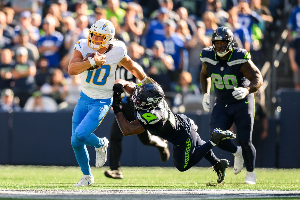Los Angeles Chargers quarterback Justin Herbert (10) runs the ball during an NFL game between the Los Angeles Chargers and Seattle Seahawks on Sunday, October 4, 2026 at Lumen Field in Seattle, Washington Los Angeles Chargers quarterback Justin Herbert (10) runs the ball during an NFL game between the Los Angeles Chargers and Seattle Seahawks on Sunday, October 4, 2026 at Lumen Field in Seattle, Washington