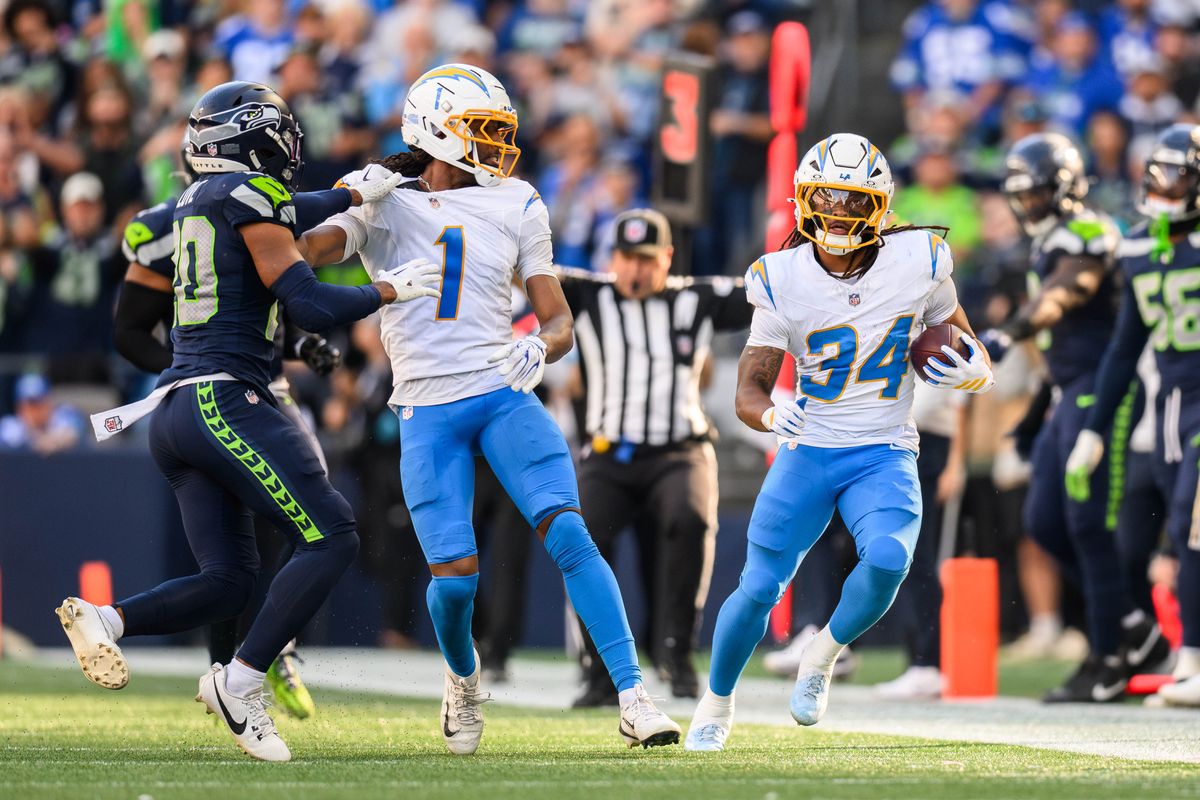 Los Angeles Chargers running back Keaton Mitchell (34) runs the ball during an NFL game between the Los Angeles Chargers and Seattle Seahawks on Sunday, October 4, 2026 at Lumen Field in Seattle, Washington Los Angeles Chargers running back Keaton Mitchell (34) runs the ball during an NFL game between the Los Angeles Chargers and Seattle Seahawks on Sunday, October 4, 2026 at Lumen Field in Seattle, Washington