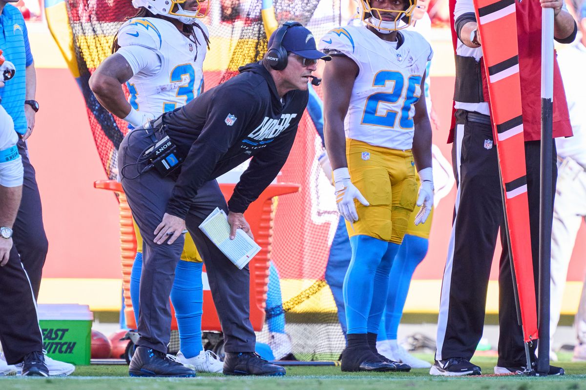 Jim Harbaugh of the Los Angeles Chargers looks on during an NFL football game against the Kansas City Chiefs, Sunday October 18, 2026 in Kansas City, Missouri. Jim Harbaugh of the Los Angeles Chargers looks on during an NFL football game against the Kansas City Chiefs, Sunday October 18, 2026 in Kansas City, Missouri.