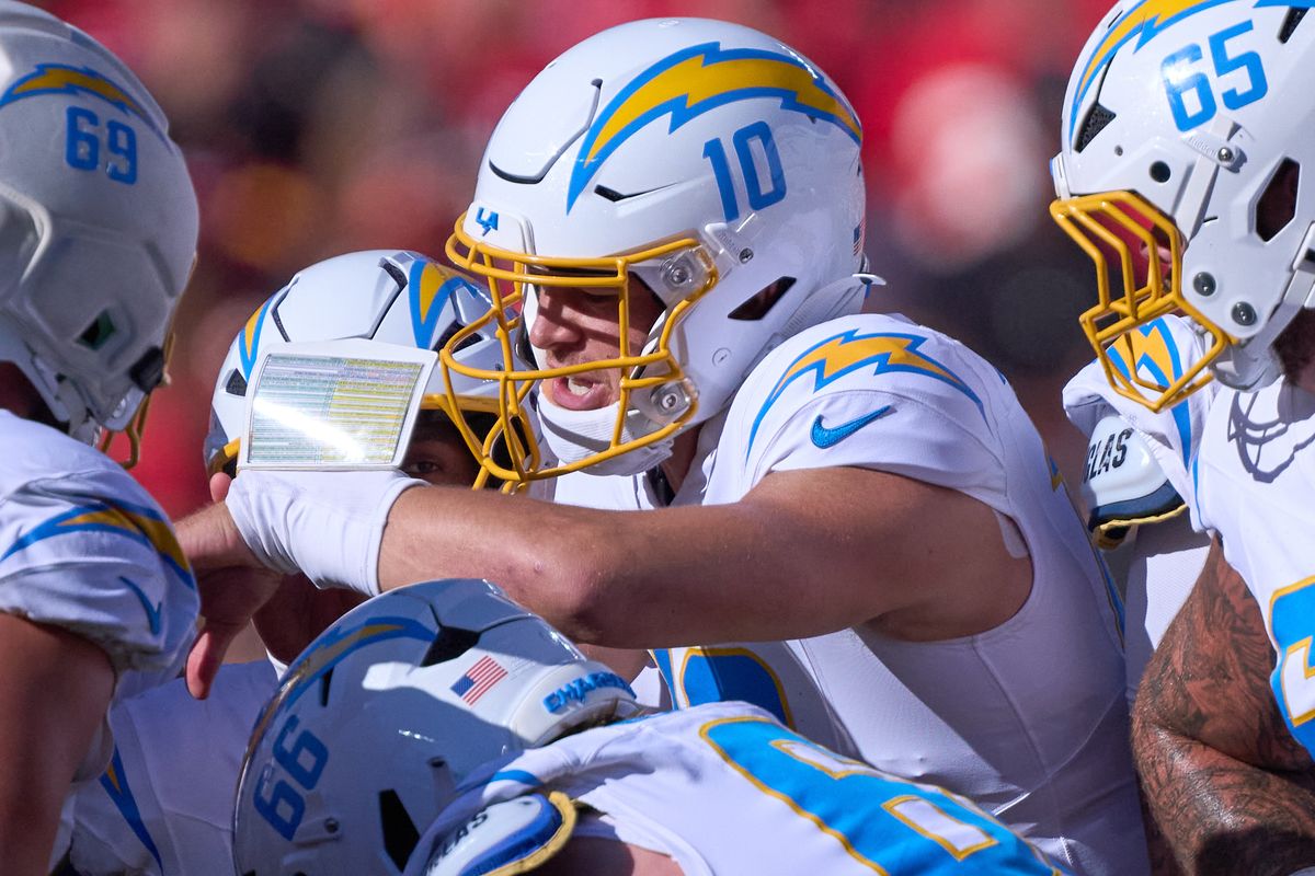 Justin Herbert #10 of the Los Angeles Chargers leads a huddle during an NFL football game against the Kansas City Chiefs, Sunday October 18, 2026 in Kansas City, Missouri. Justin Herbert #10 of the Los Angeles Chargers leads a huddle during an NFL football game against the Kansas City Chiefs, Sunday October 18, 2026 in Kansas City, Missouri.