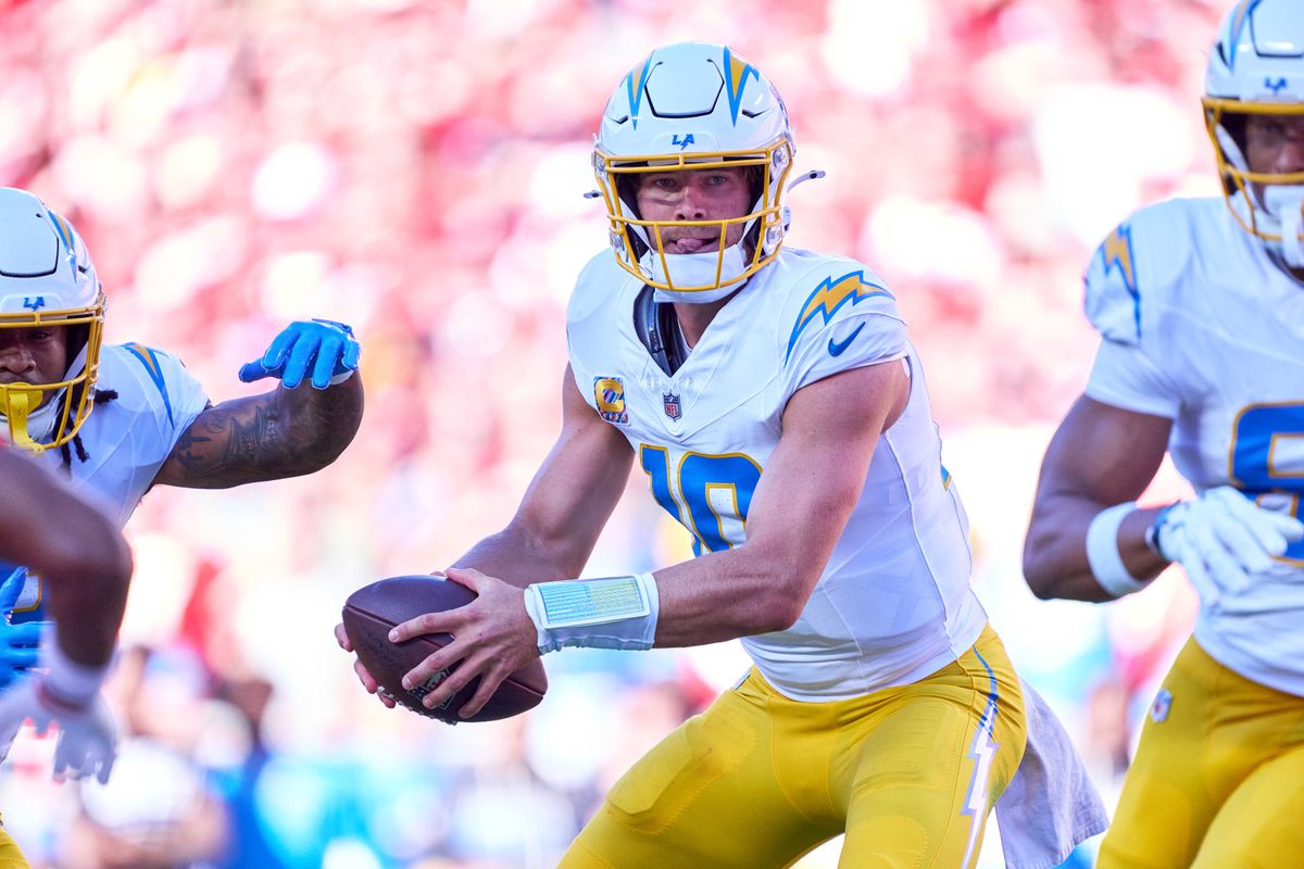 Justin Herbert #10 of the Los Angeles Chargers handles the football during an NFL football game against the Kansas City Chiefs, Sunday October 18, 2026 in Kansas City, Missouri. Justin Herbert #10 of the Los Angeles Chargers handles the football during an NFL football game against the Kansas City Chiefs, Sunday October 18, 2026 in Kansas City, Missouri.