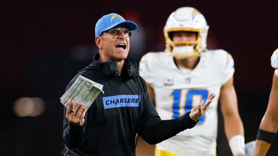 Head coach Jim Harbaugh of the Los Angeles Chargers reacts in the fourth quarter during a game against the Arizona Cardinals at State Farm Stadium on October 21, 2024 in Glendale, Arizona.