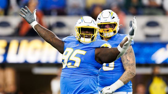 Poona Ford #95 of the Los Angeles Chargers celebrates a sack during the first half against the Cincinnati Bengals at SoFi Stadium on November 17, 2024 in Inglewood, California. 