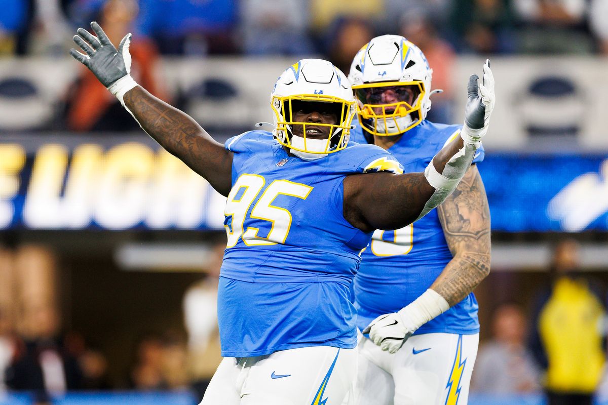Poona Ford #95 of the Los Angeles Chargers celebrates a sack during the first half against the Cincinnati Bengals at SoFi Stadium on November 17, 2024 in Inglewood, California. Poona Ford #95 of the Los Angeles Chargers celebrates a sack during the first half against the Cincinnati Bengals at SoFi Stadium on November 17, 2024 in Inglewood, California.