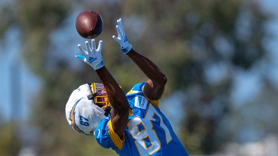 Los Angeles Chargers' wide receiver, Dez Fitzpatrick 87, reaches for a pass from Justin Herbert (10) during training camp July 17, 2025 at The Bolt training facility in El Segundo, CA.