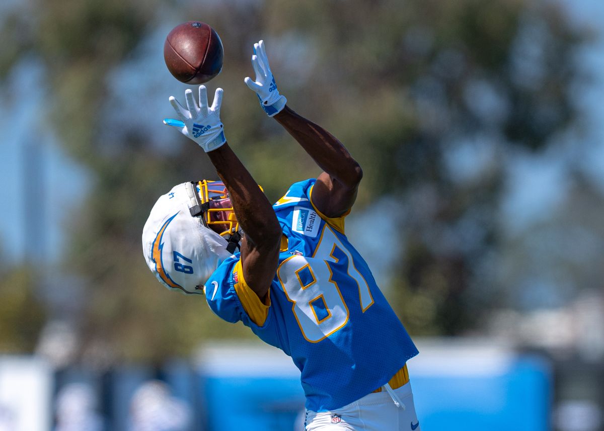 Los Angeles Chargers' wide receiver, Dez Fitzpatrick 87, reaches for a pass from Justin Herbert (10) during training camp July 17, 2025 at The Bolt training facility in El Segundo, CA.