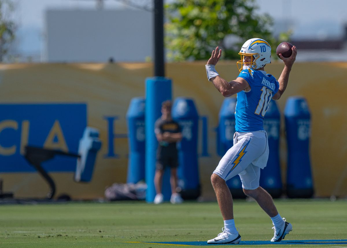 Los Angeles Chargers' quarterback, Justin Herbert 10, passes to wide receiver Quentin Johnston 1, during training camp July 17, 2025 at The Bolt training facility in El Segundo, CA.