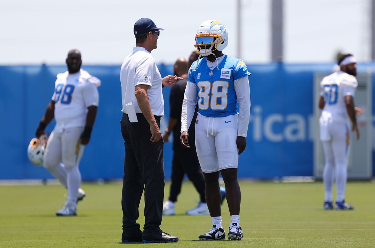Los Angeles Chargers head coach Jim Harbaugh speaks with #88 WR Jalen Reagor during training camp on July 18, 2025 at the Bolt practice facility in El Segundo, CA. Los Angeles Chargers head coach Jim Harbaugh speaks with #88 WR Jalen Reagor during training camp on July 18, 2025 at the Bolt practice facility in El Segundo, CA.