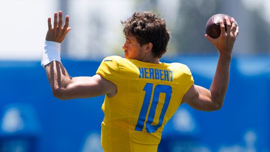 Justin Herbert #10 of the Los Angeles Chargers throws during training camp practice at The Bolt on July 24, 2025 in El Segundo, California. 