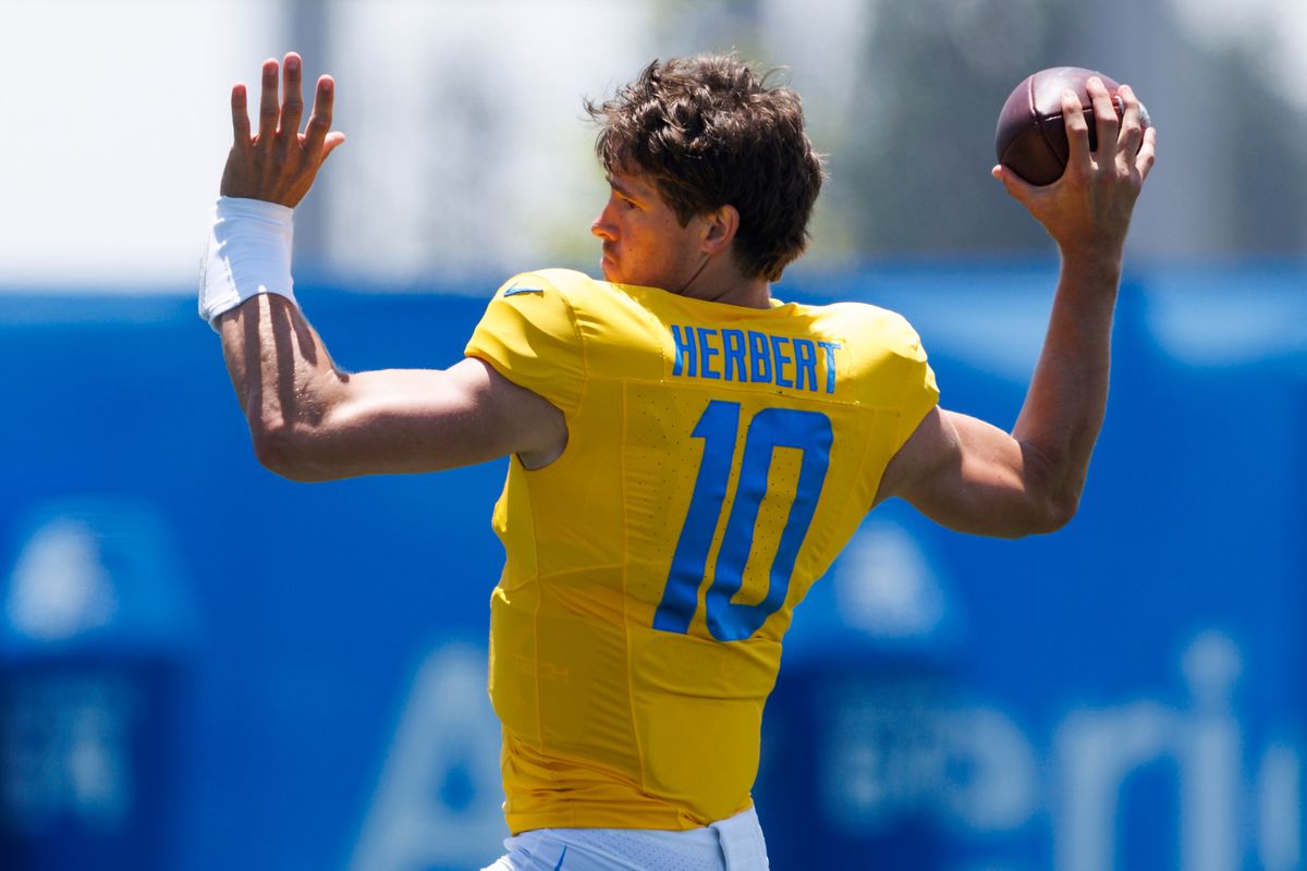 Justin Herbert #10 of the Los Angeles Chargers throws during training camp practice at The Bolt on July 24, 2025 in El Segundo, California. Justin Herbert #10 of the Los Angeles Chargers throws during training camp practice at The Bolt on July 24, 2025 in El Segundo, California.