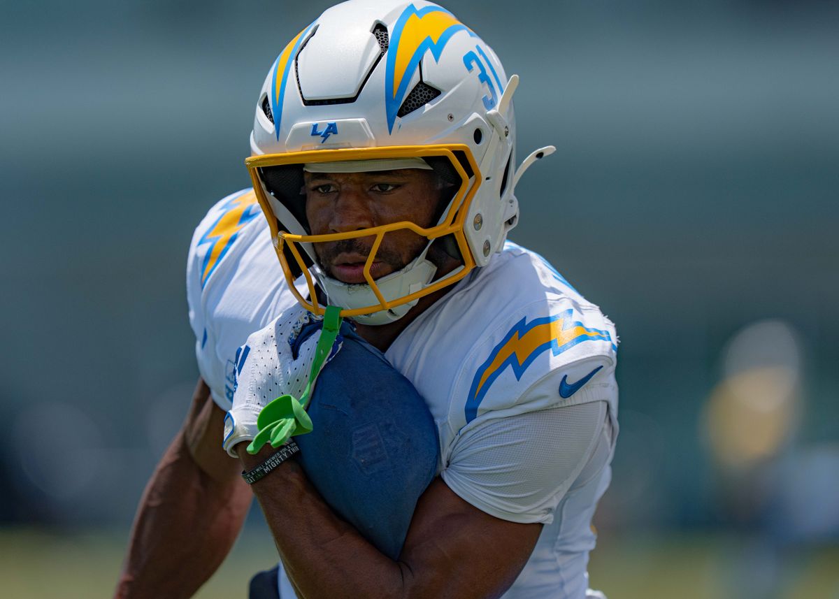 Los Angeles Chargers' running back, Trikweze Bridges 31, practices ball security while rushing during training camp on July 29, 2025 at the Bolt in El Segundo, CA.