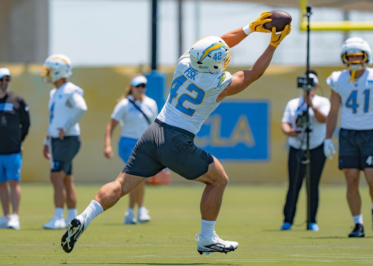 Los Angeles Chargers' tight end, Tucker Fisk 42, leaps for a pass from quarterback Taylor Heinicke 4, during training camp on July 29, 2025 at the Bolt in El Segundo, CA.