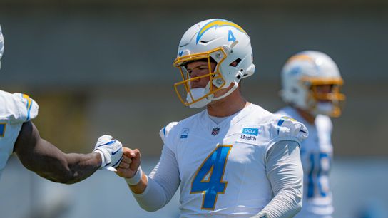 Los Angeles Chargers' quarterback, Taylor Heinicke 4, greets teammates during training camp on July 29, 2025 at the Bolt in El Segundo, CA.