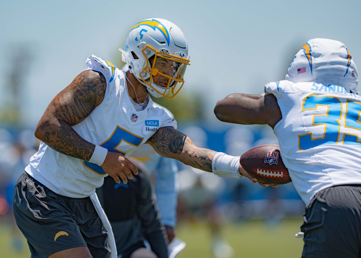 Los Angeles Chargers' quarterback, Trey Lance 5, practices handing the ball off to running back Raheim Sanders 35, during training camp on July 29, 2025 at the Bolt in El Segundo, CA.