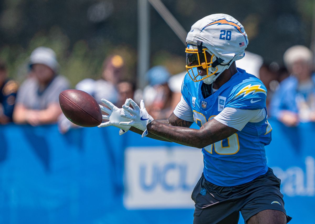 Los Angeles Chargers' running back, Hassan Haskins 28, receives a pass during practice at the Chargers' NFL training camp on Sunday, August 3, 2025 at The Bolt in El Segundo, CA. Los Angeles Chargers' running back, Hassan Haskins 28, receives a pass during practice at the Chargers' NFL training camp on Sunday, August 3, 2025 at The Bolt in El Segundo, CA.