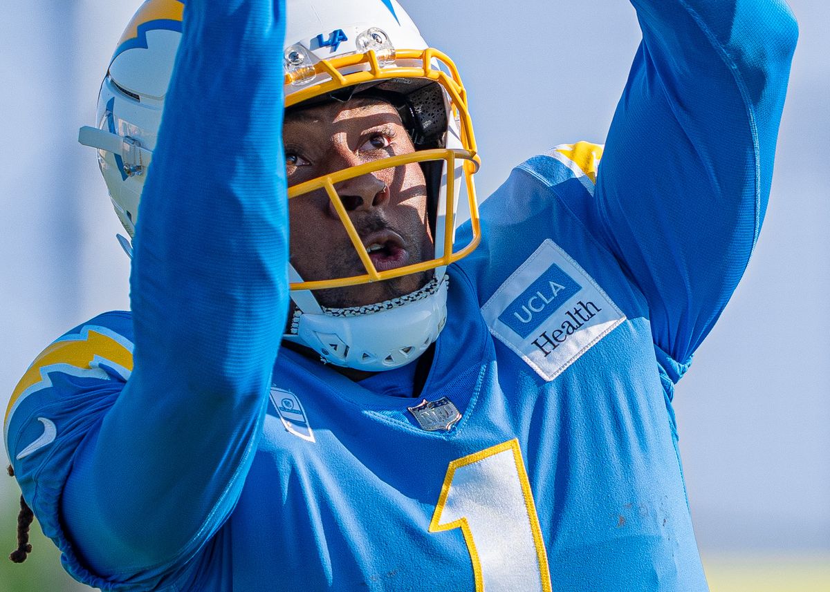 Los Angeles Chargers' wide receiver, Quentin Johnston (1), leaps for a pass from quarterback Justin Herbert (10) during practice at The Bolt on Tuesday, August 5th, 2025 in El Segundo, CA.