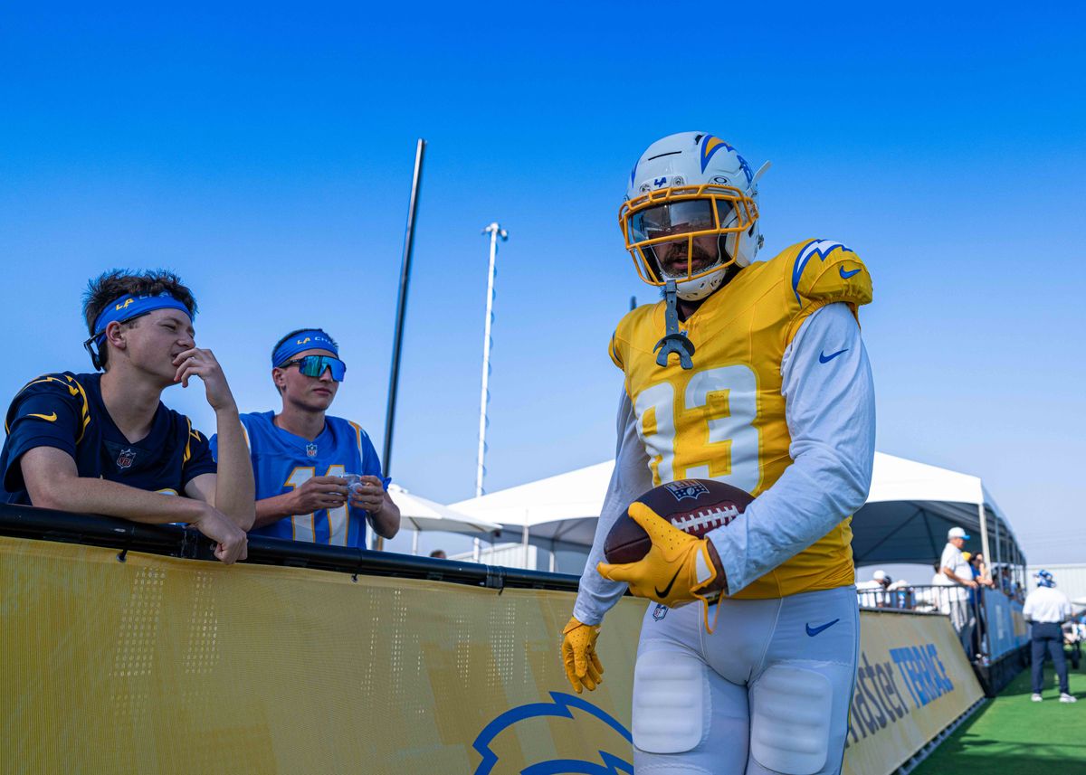Los Angeles Chargers' tight end, Tyler Conklin (83), greets fans after a touchdown catch during practice at The Bolt on Tuesday, August 5th, 2025 in El Segundo, CA.