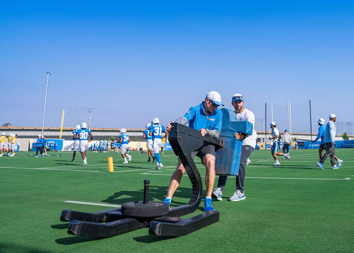 Los Angeles Chargers' equipment staff prepare gear for blocking drills during practice at The Bolt on Tuesday, August 5th, 2025 in El Segundo, CA.