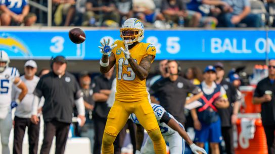 Los Angeles Chargers wide receiver, Keenan Allen 13, jumps to catch a pass during an NFL football game against the Indianapolis Colts, Sunday, October 19 in Los Angeles, California.