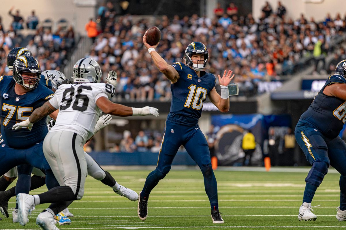 Los Angeles Chargers quarterback, Justin Herbert (10) passing during an NFL football game against the Las Vegas Raiders on November 30, 2025 in Los Angeles, CA.