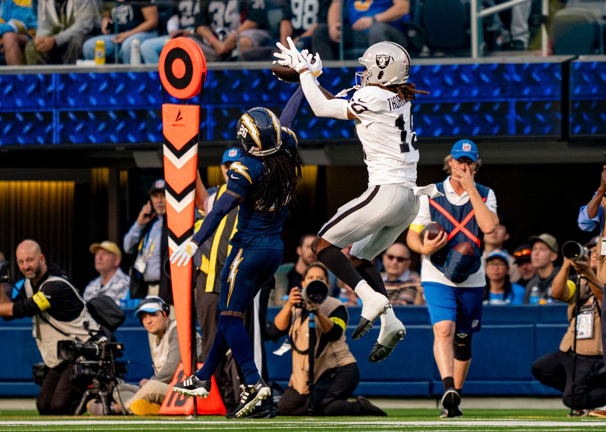 Los Angeles Chargers cornerback, Donte Jackson (26) breaks up a pass during an NFL football game against the Las Vegas Raiders on November 30, 2025 in Los Angeles, CA.
