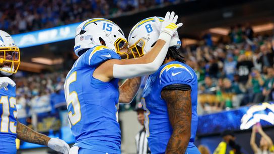 Los Angeles Chargers running back Omarion Hampton (8) runs the ball for a touchdown and celebrates with teammate during a NFL game against the Philadelphia Eagles on. Monday December 08, 2025 at Sofi Stadium in Inglewood, CA.