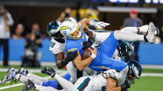 Philadelphia Eagles defensive tackle Jordan Davis (90) sacks Los Angeles Chargers quarterback Justin Herbert (10) during a NFL game against the Philadelphia Eagles on. Monday December 08, 2025 at Sofi Stadium in Inglewood, CA.