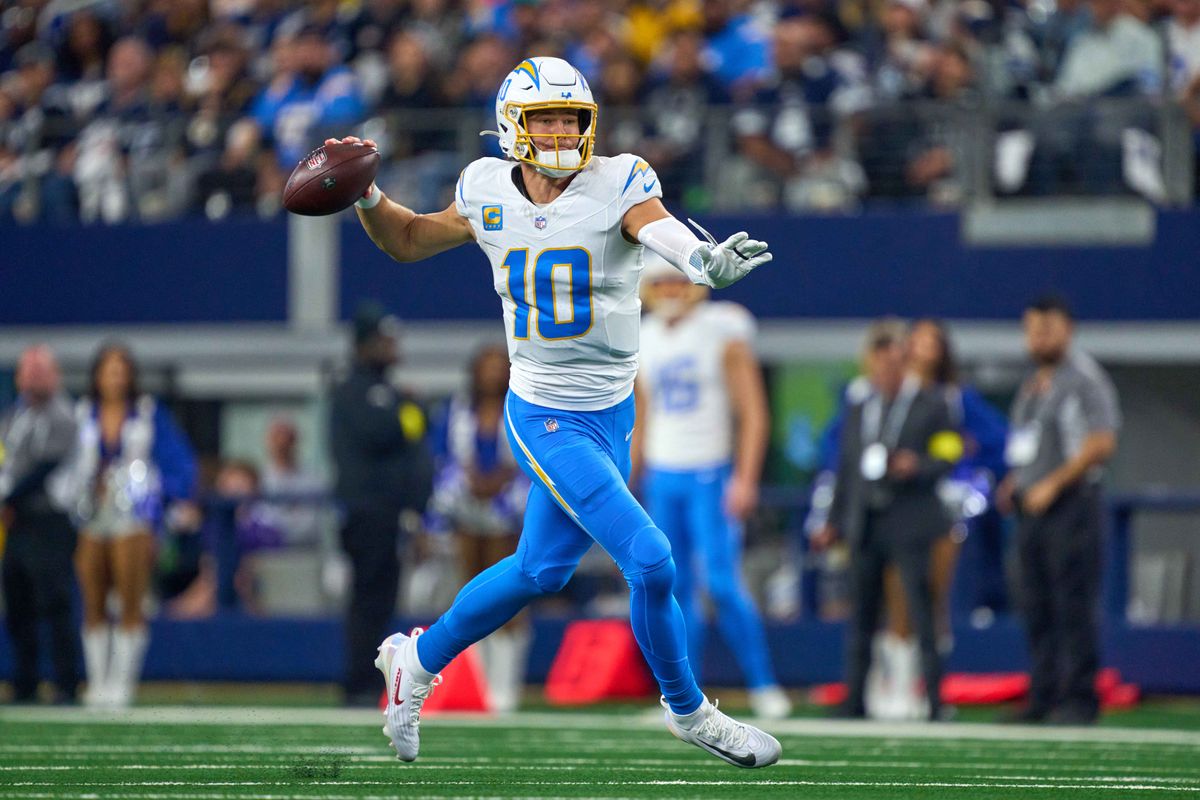Los Angeles Chargers quarterback Justin Herbert #10 throws the football during an NFL football game against the Dallas Cowboys, on Sunday December 21, 2025 in Arlington, Texas.