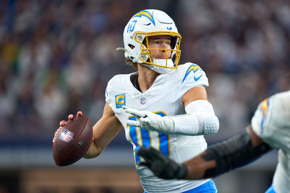 Los Angeles Chargers quarterback Justin Herbert #10 throws the football during an NFL football game against the Dallas Cowboys, on Sunday December 21, 2025 in Arlington, Texas.