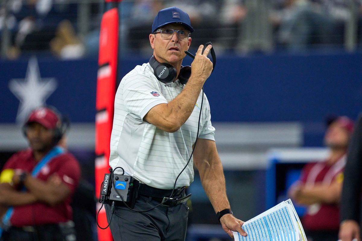 Los Angeles Chargers head coach Jim Harbaugh looks on during an NFL football game against the Dallas Cowboys, on Sunday December 21, 2025 in Arlington, Texas.