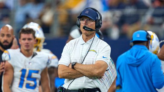 Los Angeles Chargers head coach Jim Harbaugh looks on during an NFL football game against the Dallas Cowboys, on Sunday December 21, 2025 in Arlington, Texas.