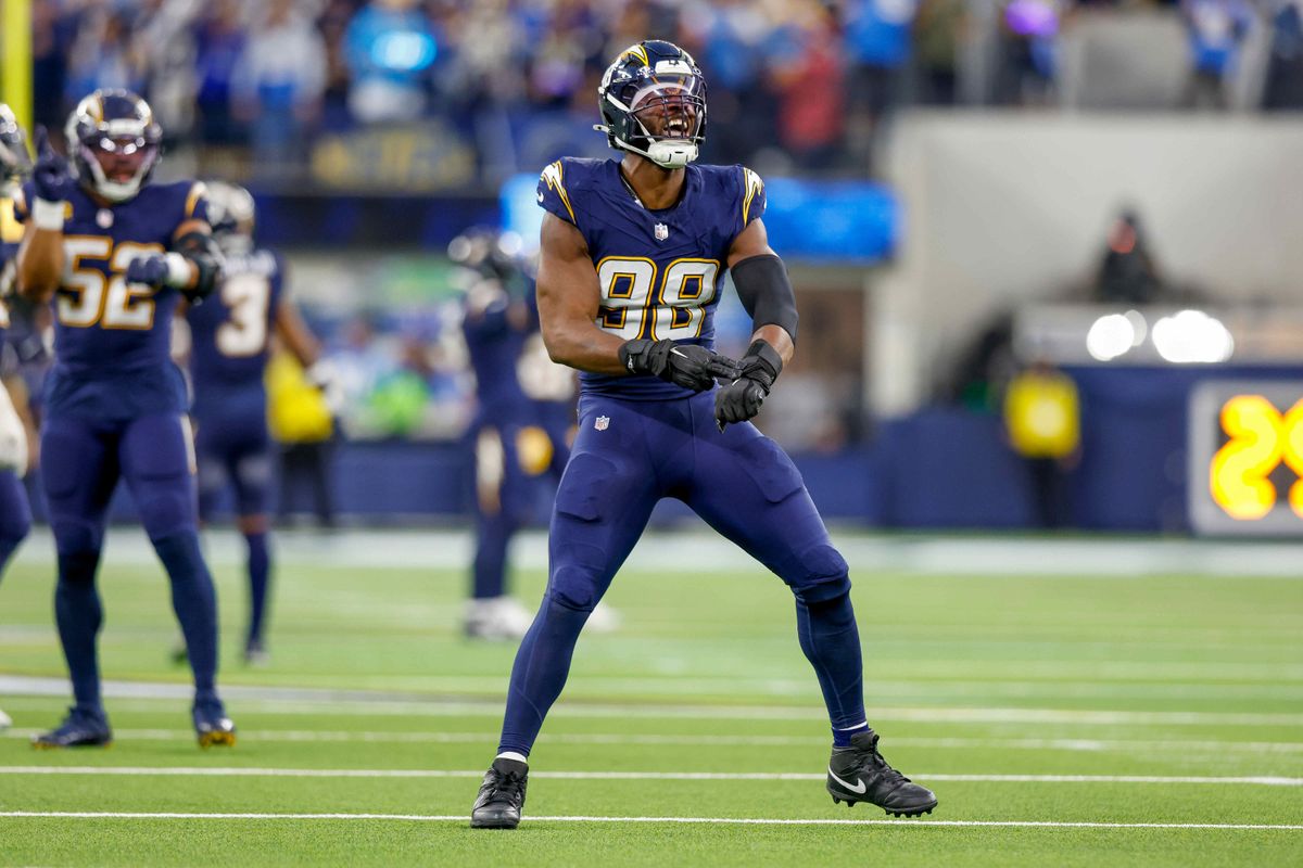 Los Angeles Chargers linebacker Odafe Oweh (98) celebrates after a sack during a NFL game against the Houston Texans on December 027, 2025 at Sofi Stadium in Inglewood, CA.
